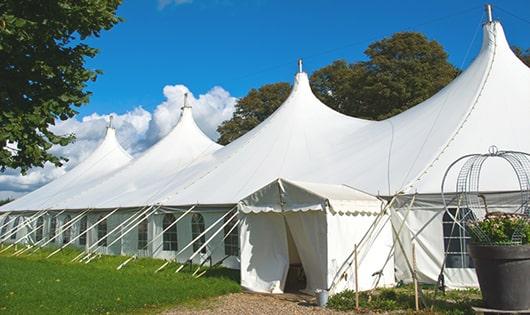 high-quality portable restrooms stationed at a wedding, meeting the needs of guests throughout the outdoor reception in Lakewood